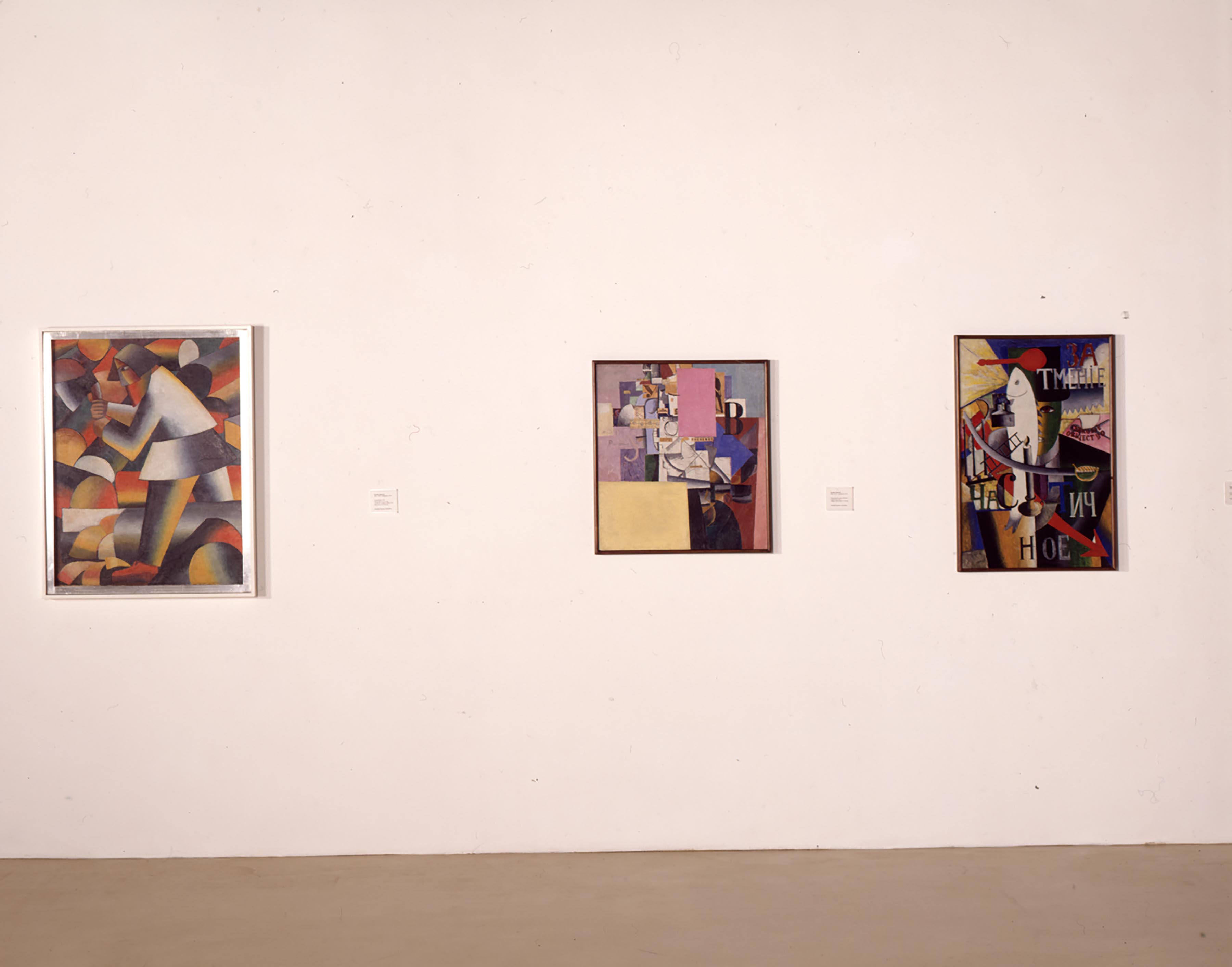 Kazimir Malevich, Il taglialegna, 1912; Donna davanti a una colonnina pubblicitaria, 1914; Un inglese a Mosca, 1913-14